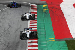 Sergey Sirotkin, Williams FW41, leads Marcus Ericsson, Sauber C37, and Brendon Hartley, Toro Rosso STR13, to the grid