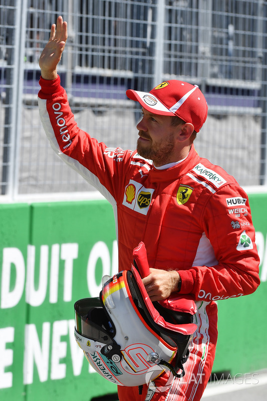 Pole sitter Sebastian Vettel, Ferrari celebrates in parc ferme