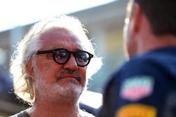 (L to R): Flavio Briatore with Christian Horner, Red Bull Racing Team Principal