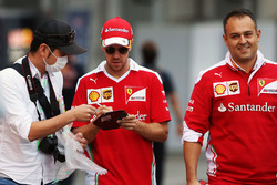 Sebastian Vettel, Ferrari signs autographs for the fans