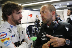 Fernando Alonso, McLaren MP4-31 in the garage with Matt Morris