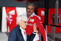 (L to R): Bernie Ecclestone, with Maurizio Arrivabene, Ferrari Team Principal
