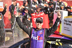 Race winner Denny Hamlin, Joe Gibbs Racing Toyota