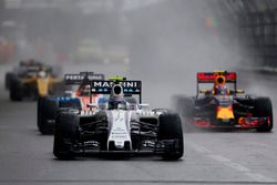 Valtteri Bottas, Williams FW38, leads Max Verstappen, Red Bull Racing RB12, and Pascal Wehrlein, Manor MRT 05