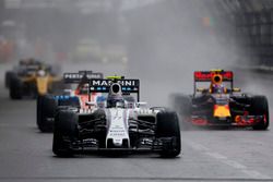 Valtteri Bottas, Williams FW38, leads Max Verstappen, Red Bull Racing RB12, and Pascal Wehrlein, Man