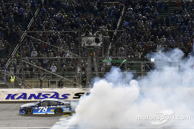 Martin Truex Jr., Furniture Row Racing Toyota celebrates his win with a burnout