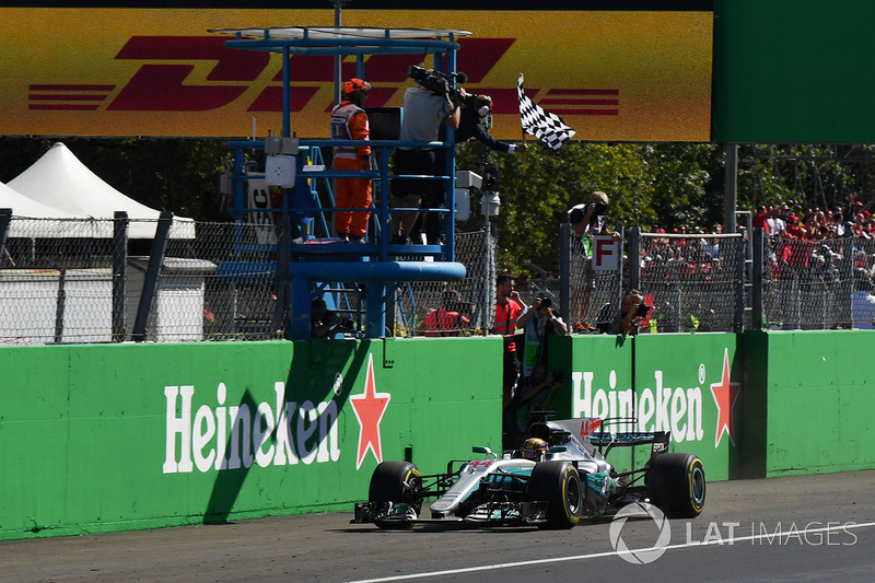 Race winner Lewis Hamilton, Mercedes-Benz F1 W08  takes the chequered flag