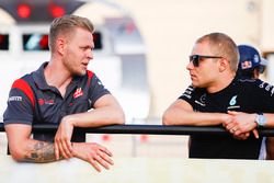 Kevin Magnussen, Haas F1 Team, with Valtteri Bottas, Mercedes AMG