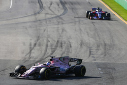 Sergio Perez, Force India VJM10, leads Carlos Sainz Jr., Scuderia Toro Rosso STR12