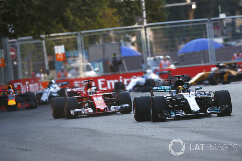 Lewis Hamilton, Mercedes AMG F1 W08 leads Sebastian Vettel, Ferrari SF70H