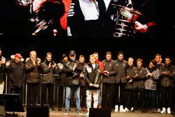 World Champion Nico Rosberg celebrates with the team and Chairman of the Board of Directors of Daimler AG and Head of Mercedes-Benz Dieter Zetsche 