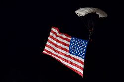 Pre-race American flag parachuter 