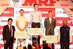MRF Challenge champion Harrison Newey, second place Joey Mawson, third place Mick Schumacher with Sachin Tendulkar and Arun Mammen, MRF Managing Director and Executive Director