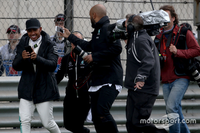 Lewis Hamilton, Mercedes AMG, takes to the track to entertain the fans