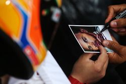 Lewis Hamilton, Mercedes AMG, signs autographs for fans