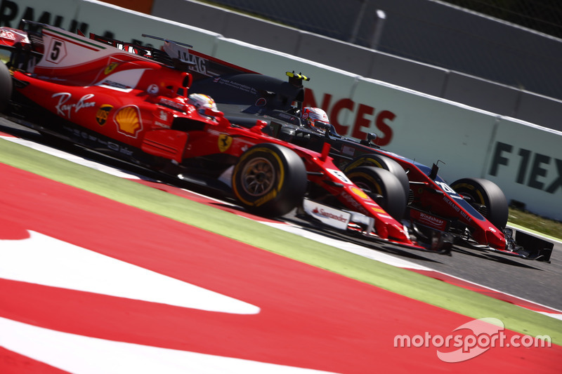 Kevin Magnussen, Haas F1 Team VF-17, Sebastian Vettel, Ferrari SF70H