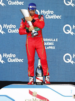 Lucas di Grassi, ABT Schaeffler Audi Sport, with his trophy on the podium