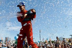 Lucas di Grassi, ABT Schaeffler Audi Sport, sprays the champagne on the podium