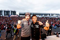 Takuma Sato on stage with Fernando Alonso, McLaren