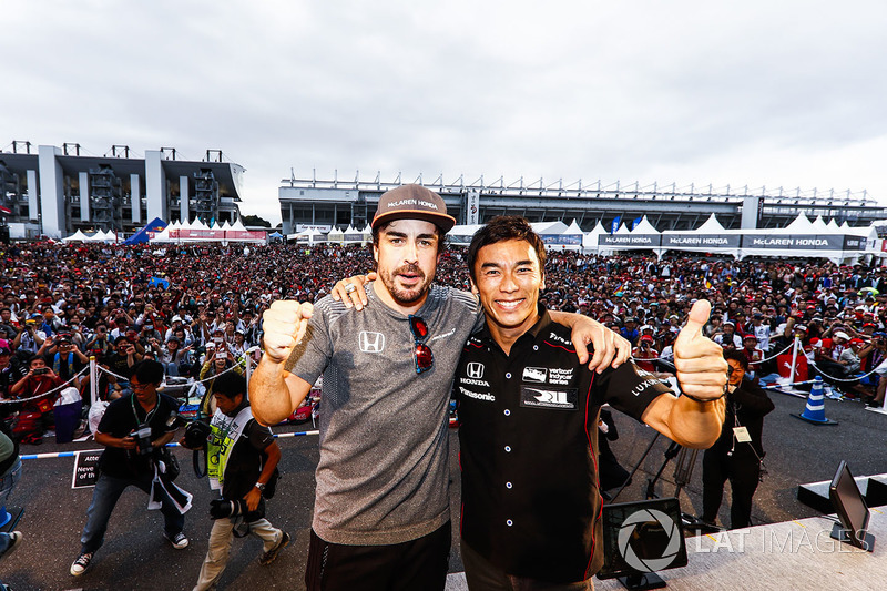 Takuma Sato on stage with Fernando Alonso, McLaren