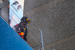 Daniel Ricciardo, Red Bull Racing celebrates on the podium with the champagne