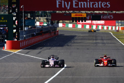 Kimi Raikkonen, Ferrari SF70H, battles with Sergio Perez, Sahara Force India F1 VJM10