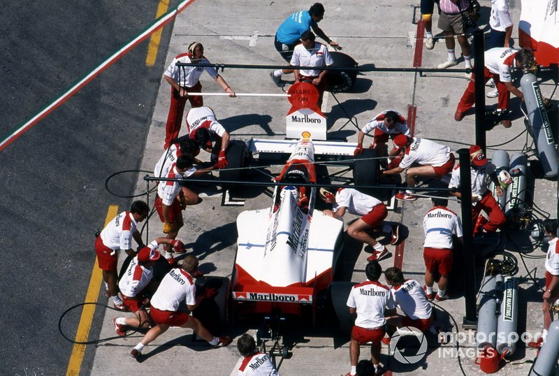 Alain Prost, McLaren MP4-5, makes a pit stop