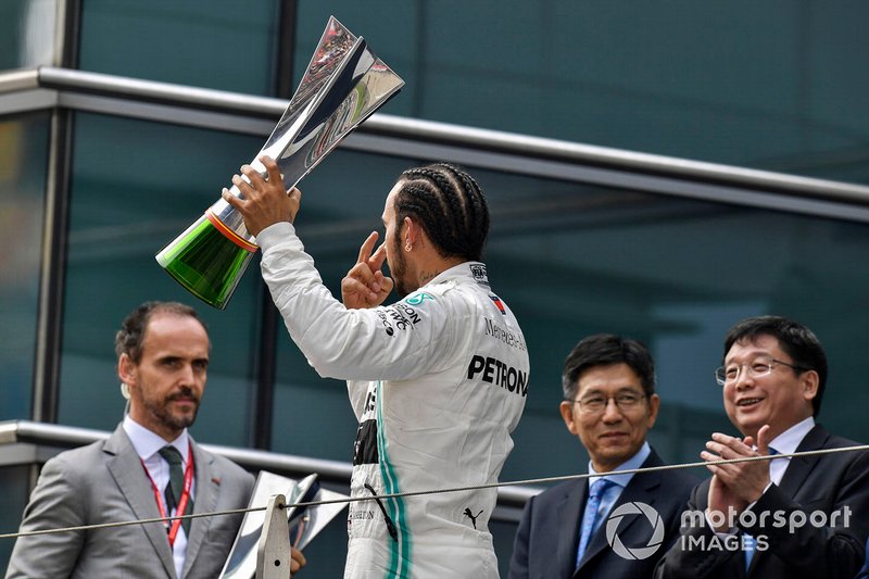 Lewis Hamilton, Mercedes AMG F1, 1st position, lifts his trophy