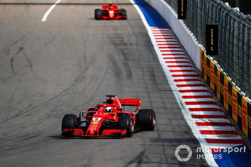 Sebastian Vettel, Ferrari SF71H, leads Kimi Raikkonen, Ferrari SF71H
