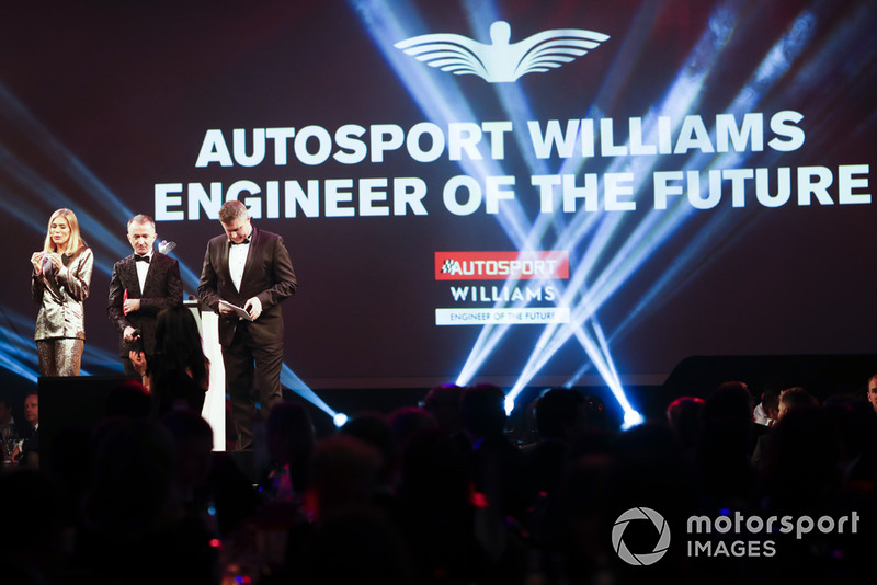 Nicki Shields and David Croft on stage with Paddy Lowe to present the Autosport Williams Engineer of the Future Award