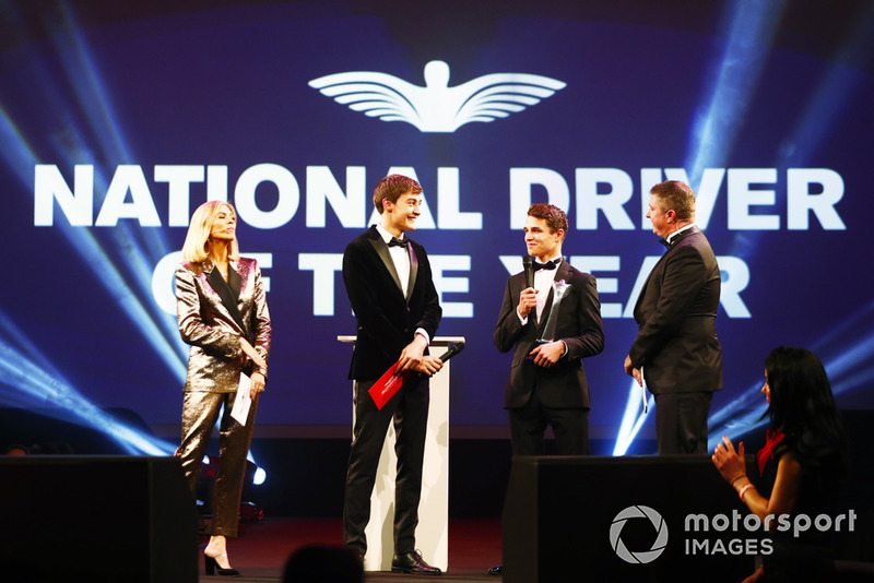 Williams F1 Driver George Russell, and McLaren F1 driver Lando Norris on stage to present the National Racing Driver Award to Dan Ticktum