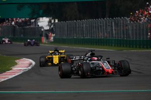 Romain Grosjean, Haas F1 Team VF-18 y Nico Hulkenberg, Renault Sport F1 Team R.S. 18 