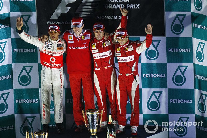 Lewis Hamilton, McLaren MP4-25 Mercedes, Chris Dyer, Race Engineer, Ferrari, Fernando Alonso, Ferrari F10, Felipe Massa, Ferrari F10, on the podium