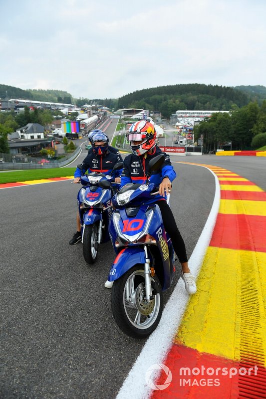 Pierre Gasly, Toro Rosso, rides on a scooter at Eau Rouge