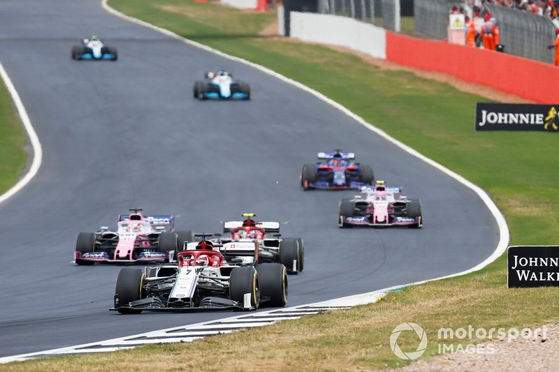 Kimi Raikkonen, Alfa Romeo Racing C38, leads Antonio Giovinazzi, Alfa Romeo Racing C38, Sergio Perez, Racing Point RP19, and Lance Stroll, Racing Point RP19