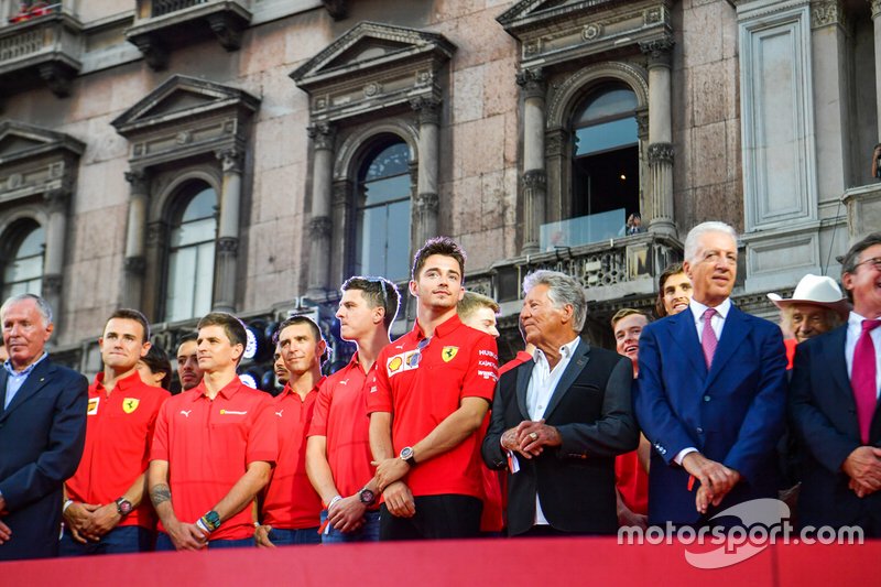 Charles Leclerc, Ferrari stands next to Mario Andretti