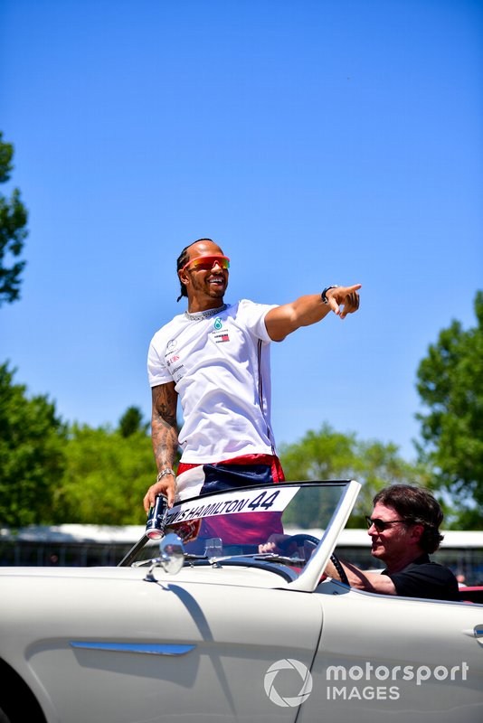 Lewis Hamilton, Mercedes AMG F1, waves to the crowd during the drivers parade
