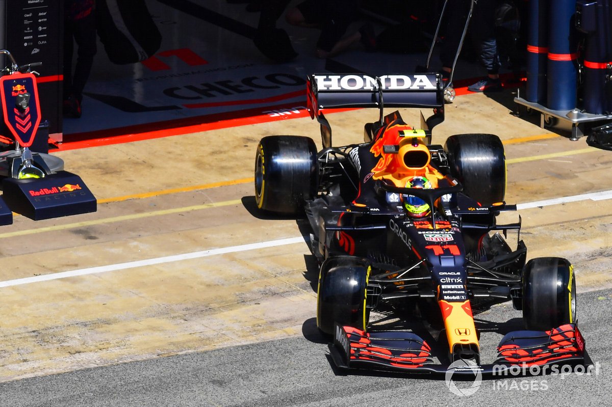 Sergio Perez, Red Bull Racing RB16B, leaves the garage