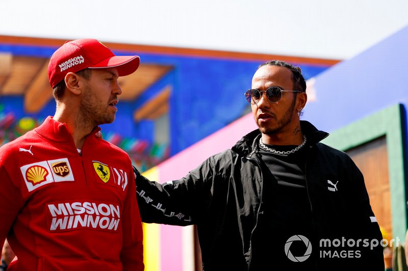 Себастьян Феттель, Ferrari, и Льюис Хэмилтон, Mercedes AMG F1