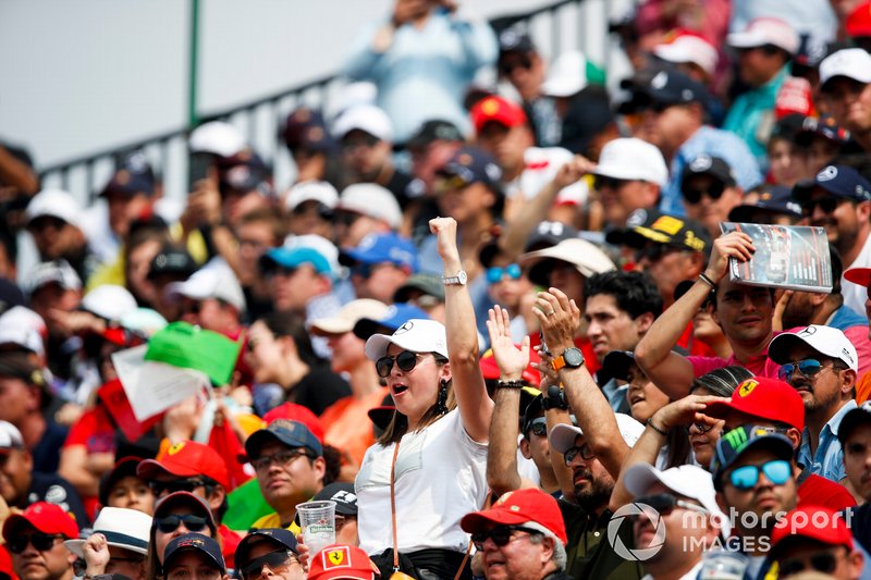 Fans cheer from the grandstands