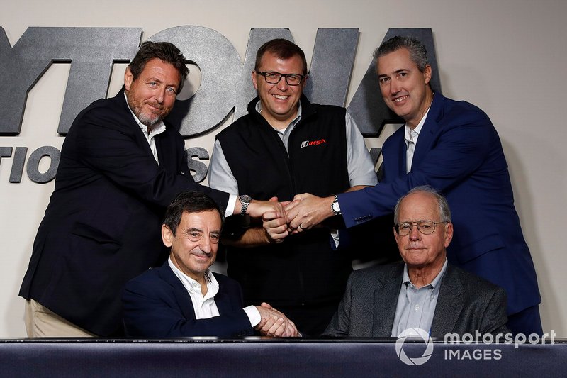 Pierre Fillon, ACO President, Jim France, IMSA Chairman, Gerard Neveu, FIA WEC CEO, John Doonan, IMSA President, and Ed Bennett, IMSA CEO