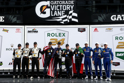 Podium: Race winner #10 Wayne Taylor Racing Cadillac DPi: Ricky Taylor, Jordan Taylor, Max Angelelli, Jeff Gordon; second place #5 Action Express Racing Cadillac DPi: Joao Barbosa, Christian Fittipaldi, Filipe Albuquerque; third place #90 VisitFlorida.com Racing Multimatic Riley LMP2: Marc Goossens, Renger van der Zande, René Rast