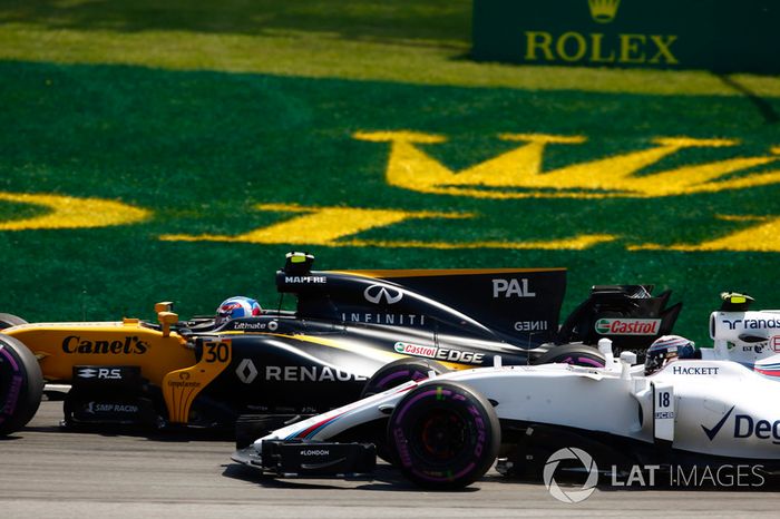 Jolyon Palmer, Renault Sport F1 Team RS17 y Lance Stroll, Williams FW40
