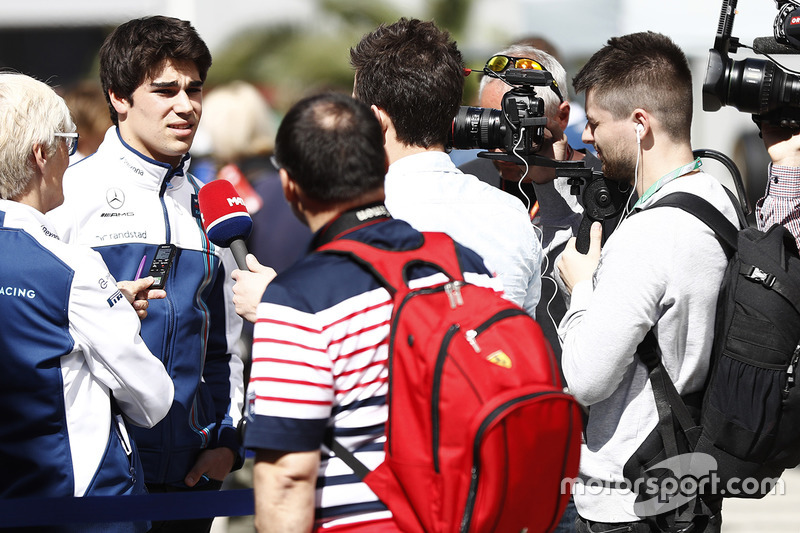 Lance Stroll, Williams, is interviewed by the media