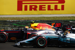 Max Verstappen, Red Bull Racing RB13, passes Lewis Hamilton, Mercedes AMG F1 W08