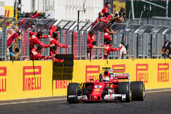 Sebastian Vettel, Ferrari SF70H, race winner, takes the chequered flag