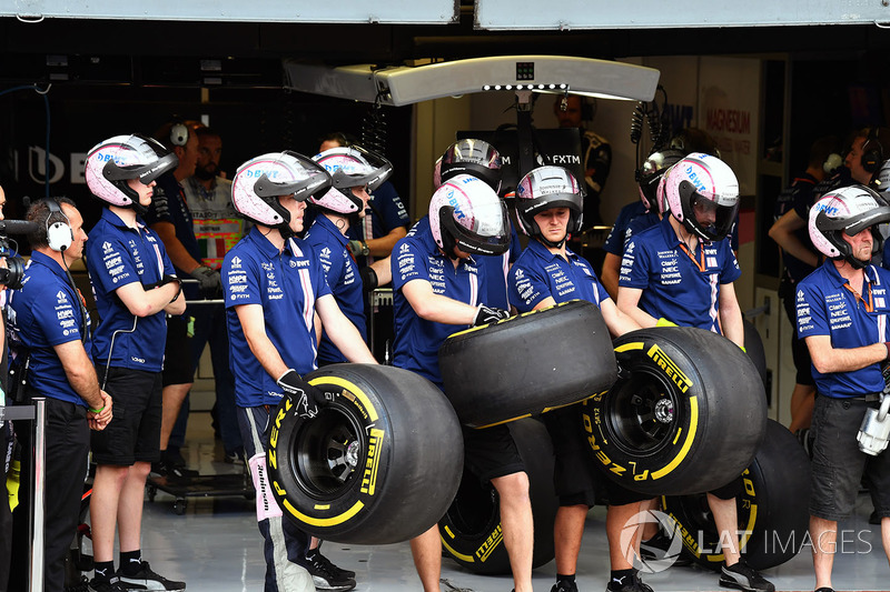 Sahara Force India mechaincs and Pirelli tyres