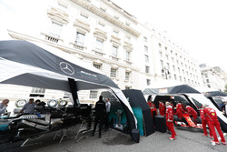 The Mercedes AMG F1 and Ferrari teams prepare for the London F1 street demonstration