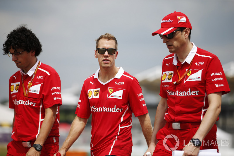 Sebastian Vettel, Ferrari, walks the track