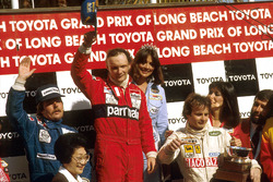 Podium: Race winner Niki Lauda, McLaren Ford; second place Keke Rosberg, Williams Ford; third place Gilles Villeneuve, Ferrari